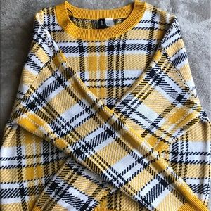 Yellow, black, and white plaid sweater
